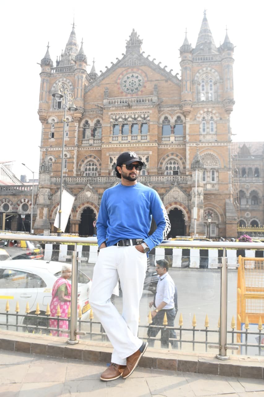 Shoheb, Founder and Director of Mumbai Footprints, in front of Chhatrapati Shivaji Maharaj Terminus (CSMT), Mumbai